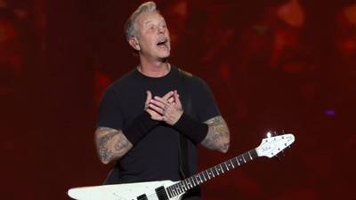 Watch Metallica members give James Hetfield a hug onstage after frontman expressed feeling "insecure"