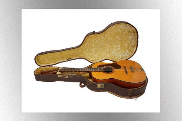 Long-lost John Lennon acoustic guitar expected to set records at auction
